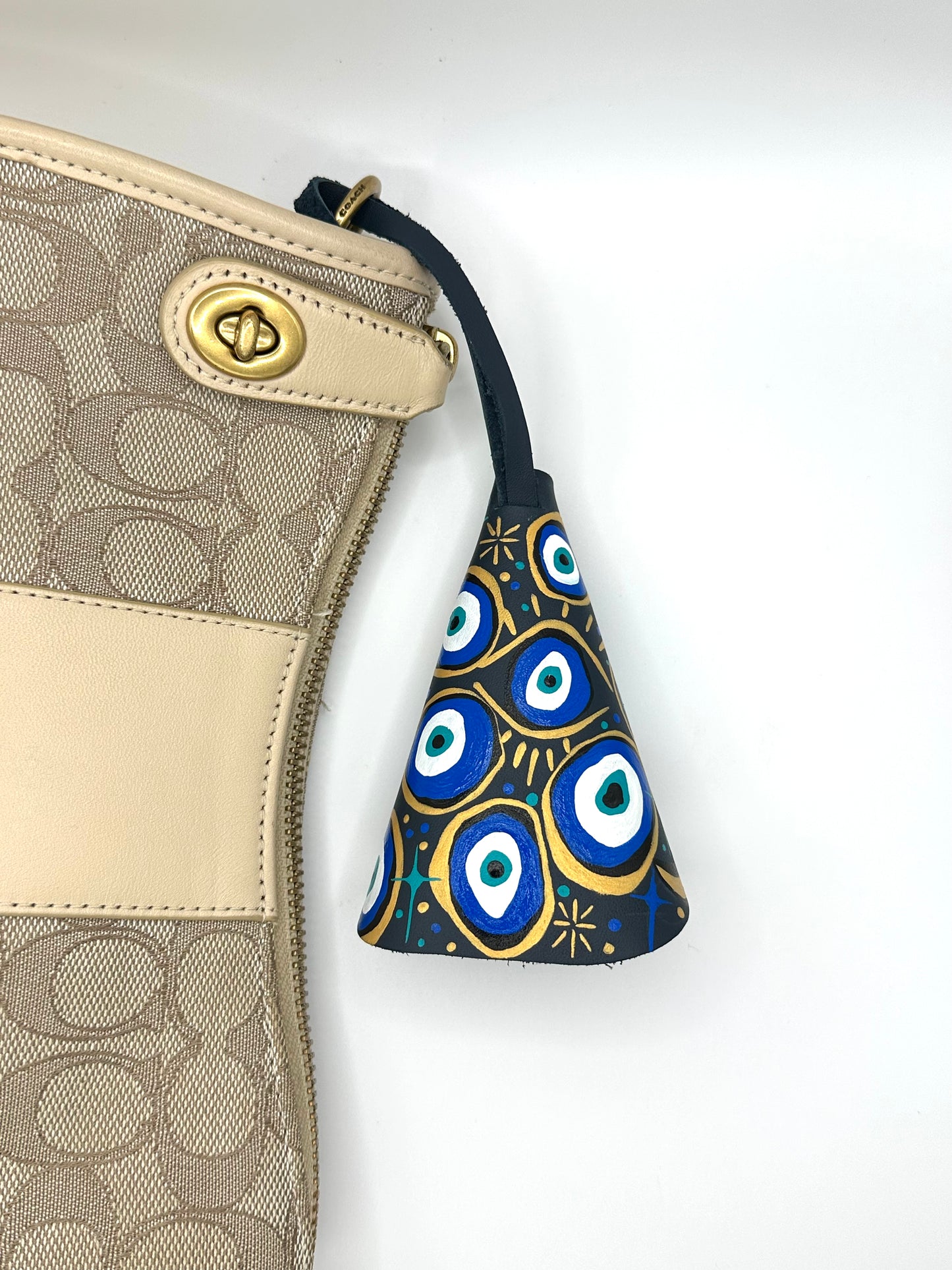 The Protective Leather Bag Charm